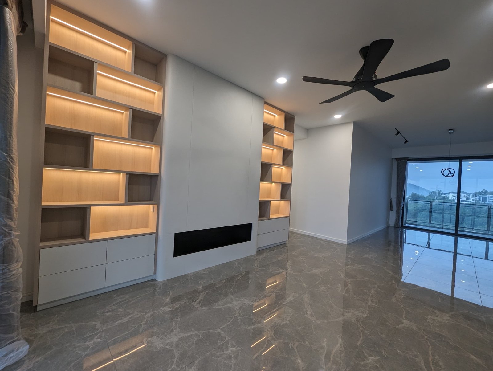 Custom illuminated living room built-in
